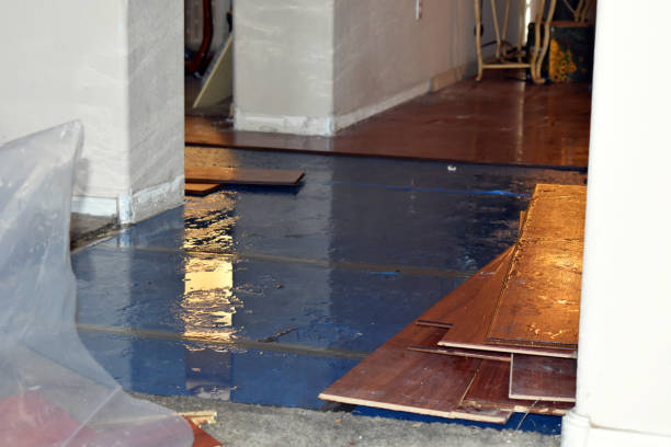 Professional Basement Flood Cleanup technician working in Chandler, OK